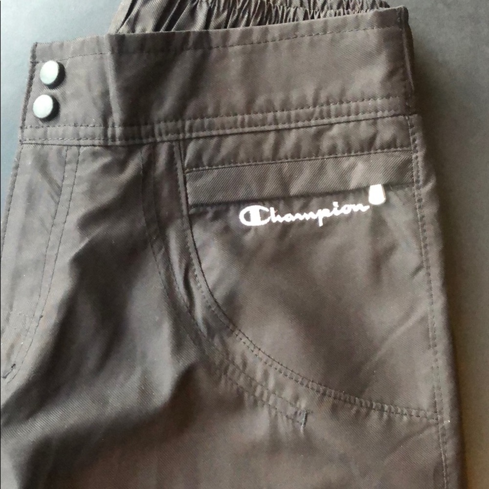 NWOT Champion woman’s black medium track pants.